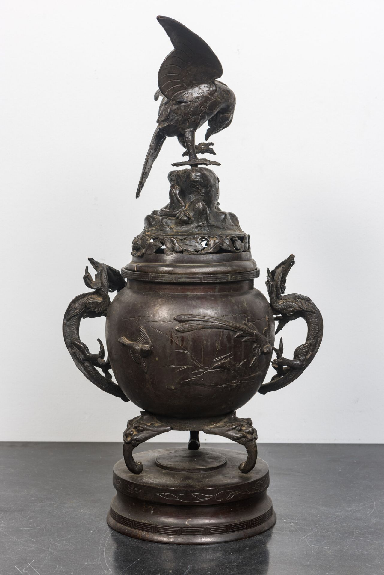 A large Japanese patinated bronze koro on stand with birds, dragons and blossoming branches, Meiji, - Bild 2 aus 2