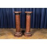 Two faux-marbre terracotta columns, 20th C.