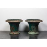 A pair of green-painted cast iron jardinires, 19th C.