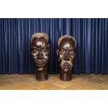 Two African wooden man's heads, 20th C.