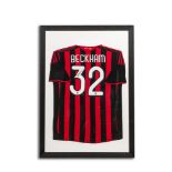 A framed and A.C. Milan football jersey signed by David Beckham