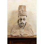 A French limestone bust of a bishop, 14/15th C.