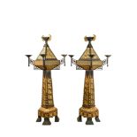 A pair of impressive partly green coloured and gilt wood, dark patinated iron and bronze Art Deco fl