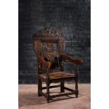 A 17th C.-style English oak Wainscot chair with Juno in her carriage drawn by peacocks, 19th C.
