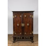 An English colonial brass mounted two-door cabinet, 19th C.