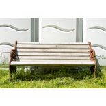 A cast iron and wooden garden bench, 20th C.