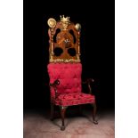 An imposing English partly gilt wooden masonic throne chair, 19th C.