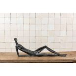 AndrŽ Fricx (1928): Reclining nude, patinated bronze, 20th C.