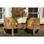 A pair of faux-bois tripod planters, 20th C.