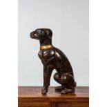 A large polychrome wooden sculpture of a dog, 1st half 20th C.