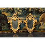 A pair of gilt wooden Louis XV mirrors, late 18th C.