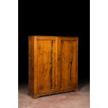 A walnut two-door cupboard, 19th C.