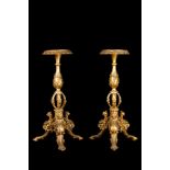 A pair of possibly Italian historicism gilt wooden pedestals, 19th C.