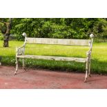 A patinated cast iron 'harlequin' garden bench, 20th C.