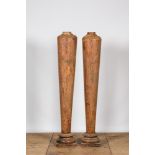 A pair of teak wooden columns on foot, Kerala, India, 19/20th C.