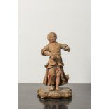 A carved wooden figure of an angel with traces of polychromy, 17/18th C.