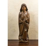 A large walnut figure of John the Baptist from a calvary, late 15th C.