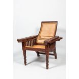 An Anglo-Indian colonial wooden reclining planter's chair, ca. 1900