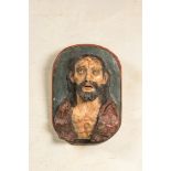 A polychrome 'cartapesta' or papier-m‰che bust of Christ in agony with glass eyes, southern Italy, L