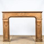 A neoclassical style oak wooden fireplace, 19th C.