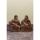 A pair of Spanish polychrome walnut reliefs depicting two prophets, Valladolid, 2nd half 16th C.