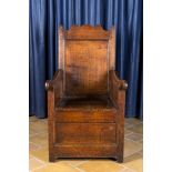 An oak throne with interior compartment, 18th C.