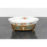 A French gilt bronze-mounted famille verte-style porcelain centerpiece with Chantilly mark, Samson,