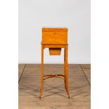 A fruitwood and burl wood veneered vanity set on foot, 20th C.