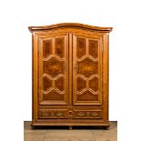 A German Louis XV-style two-door wardrobe with burl wood veneer, 19th C.