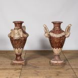 A pair of imposing marble 'eagles' vases, 20th C.