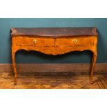 A French mahogany and burl wood veneered writing desk, late 18th C.