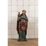 A polychromed oak figure of a Madonna with Child, 17/18th C.