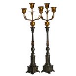 A pair of impressive 'faux marbre'-painted wooden candlesticks transformed into floor lamps with gil