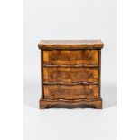 A rare small 'master proof' chest of drawers in walnut and burr wood veneer, 18th C.