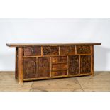 A Chinese elmwood sideboard, 19/20th C.