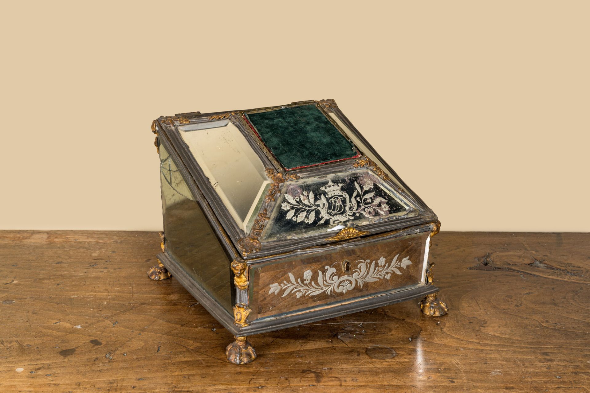 A German engraved and enamelled mirror glass and partly gilt metal box, inscribed and dated 1749