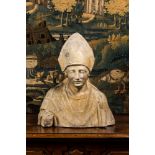 A patinated plaster bust of a bishop, 19th C.