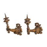 A pair of German patinated basswood wall appliques in the shape of a hand with a candlestick, 19th C