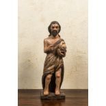 A Flemish polychromed wooden figure of Christ with the lamb, 17th C.