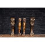 Two pairs of sculpted wooden table legs in the shape of lions, 19th C.
