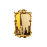 A French finely carved gilt wooden Louis XV-style mirror, 19th C.