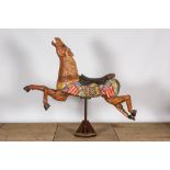 A polychrome wooden carousel horse, 20th C.