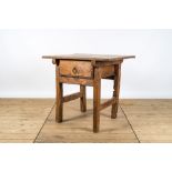 A rustic rural wooden table with drawer, 19th C.