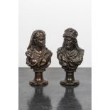 A pair of patinated bronze oriental subject busts, 19th C.