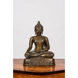 A patinated bronze figure of a seated Buddha, Burma, 19/20th C.
