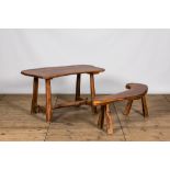 A rural hardwooden garden table with matching bench, 20th C.