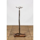 A patinated bronze floor lamp in the shape of a snake, 1st half 20th C.