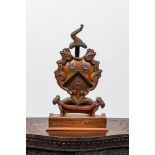 A partly polychromed wooden coat of arms with three stags, 18/19th C.
