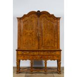 A Dutch baroque burl wood veneered two-door cabinet, 18th C.