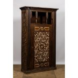 A wooden one door cupboard with islamic style bone-inlaid geometrical pattern, Northern Africa, 19/2